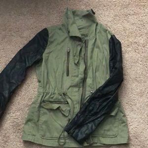 Green military jacket with faux leather sleeves